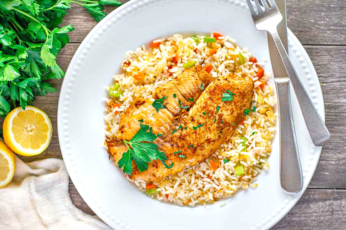 Tilapia fish over rice